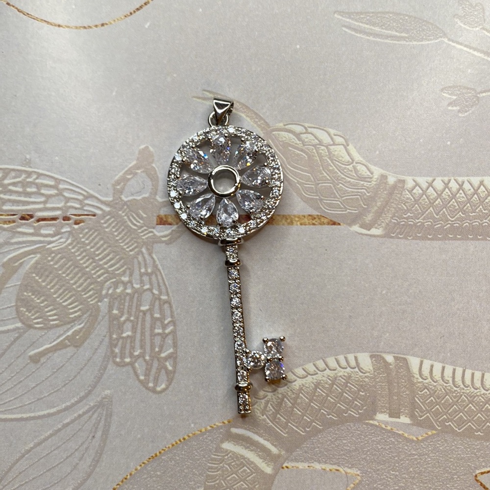 Key Charm pendant . Triple gold Plated NWT